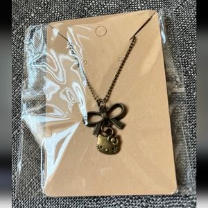 Bronzetoned Hello Kitty bow necklace